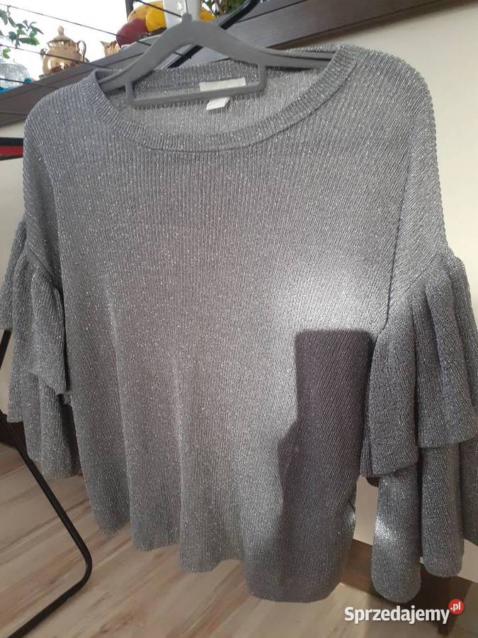 efektowny sweter z falbanami i srebrną nitką M H&M Gdańsk