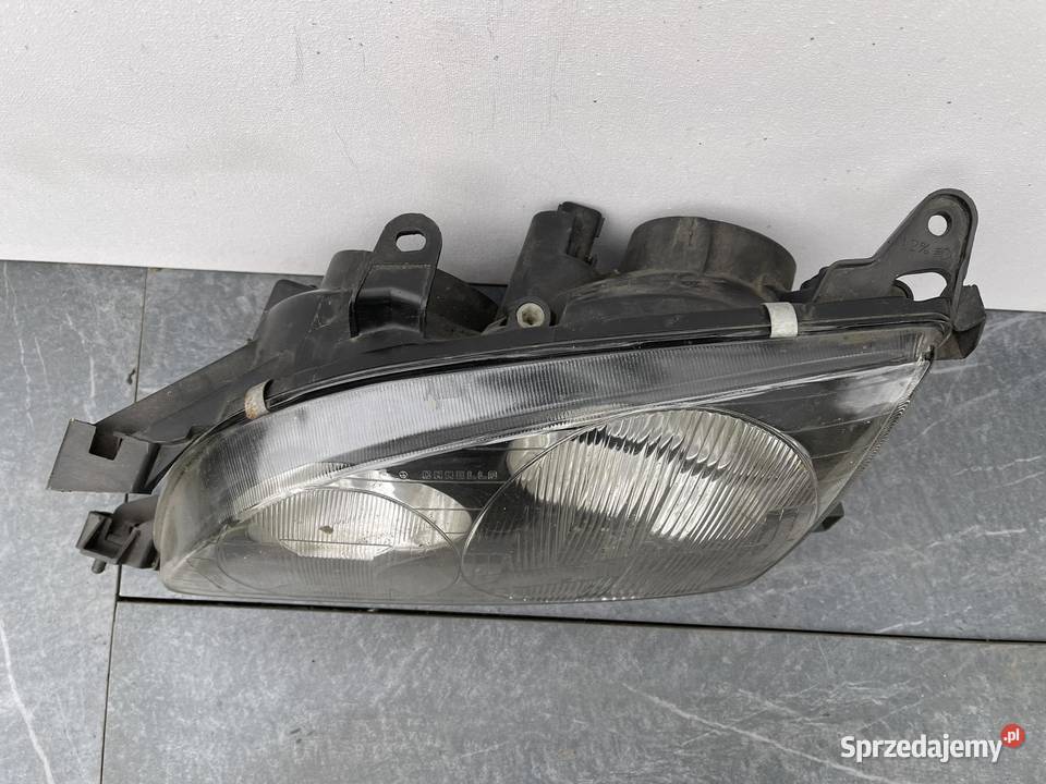 TOYOTA AVENSIS 1 T22 LEWA LAMPA PRZÓD Ostroróg sprzedam