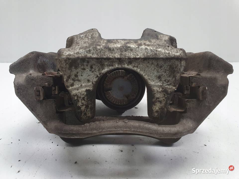 Toyota Corolla XII E21 TYLNY ZACISK HAMULCOWY