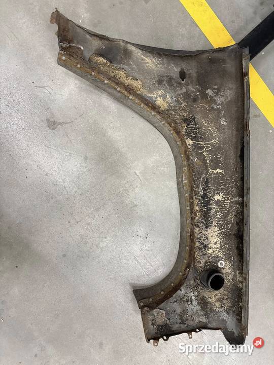 Nissan Patrol Y60 błotnik przód oryginał dobra