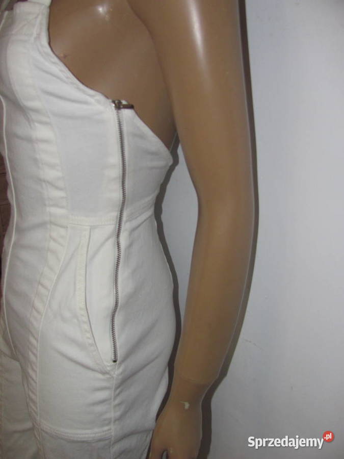 Kombinezon bez rękawów dzwony kremowe spodnie Zamość