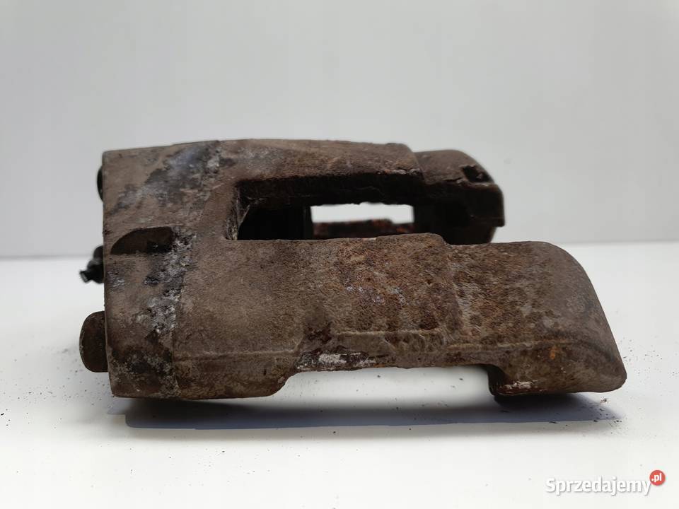 Audi A6 C6 30 TDI ZACISK HAMUCLOWY prawy przód Rudka