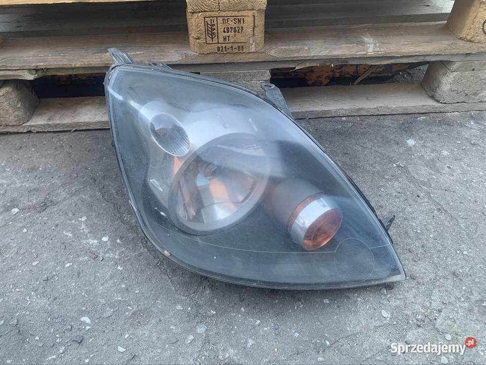 6S6113W029 reflektor lampa prawa przód Ford Szczecin