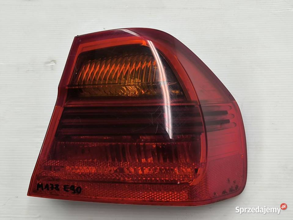LAMPA LEWY TYŁ BMW E90 20D 6937458 osobowe Lampy cofania