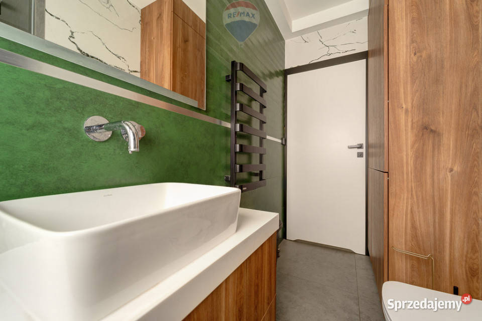 Dwukondygnacyjne mieszkanie w wysokim