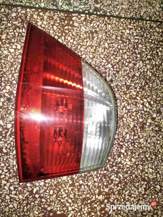 Lampa tylna lewaq w błotnik BMW E61 Biały Poręba sprzedam