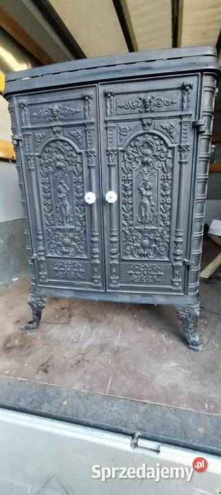 Zabytkowy kominek żeliwny 7 kW ozdobna obudowa w Piece wolnostojące