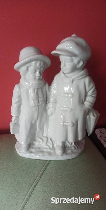 Figurka pary Ona z torebeczką On z parasolem pomorskie sprzedam