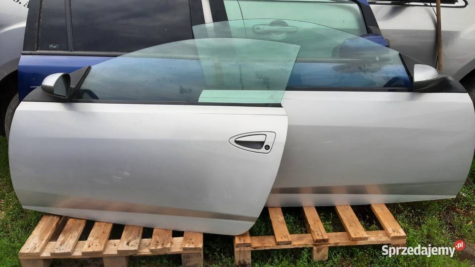 drzwi kompletne Ford Cougar prawe lewe SREBRNE osobowe Dębno