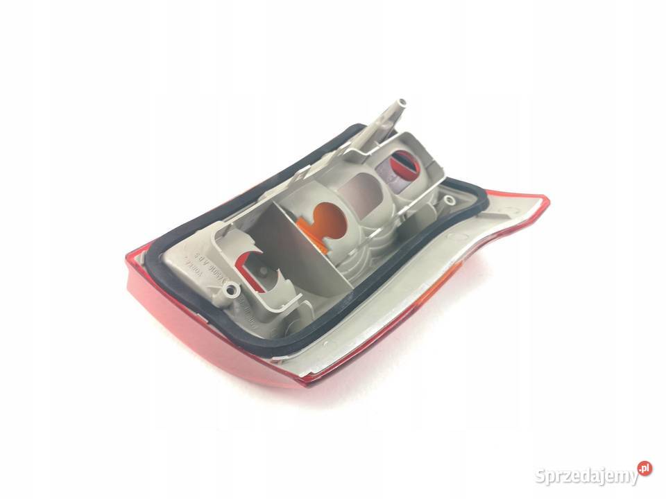 LAMPA PRAWY TYŁ OPEL ASTRA 9194 KOMBII HELLA Oświetlenie