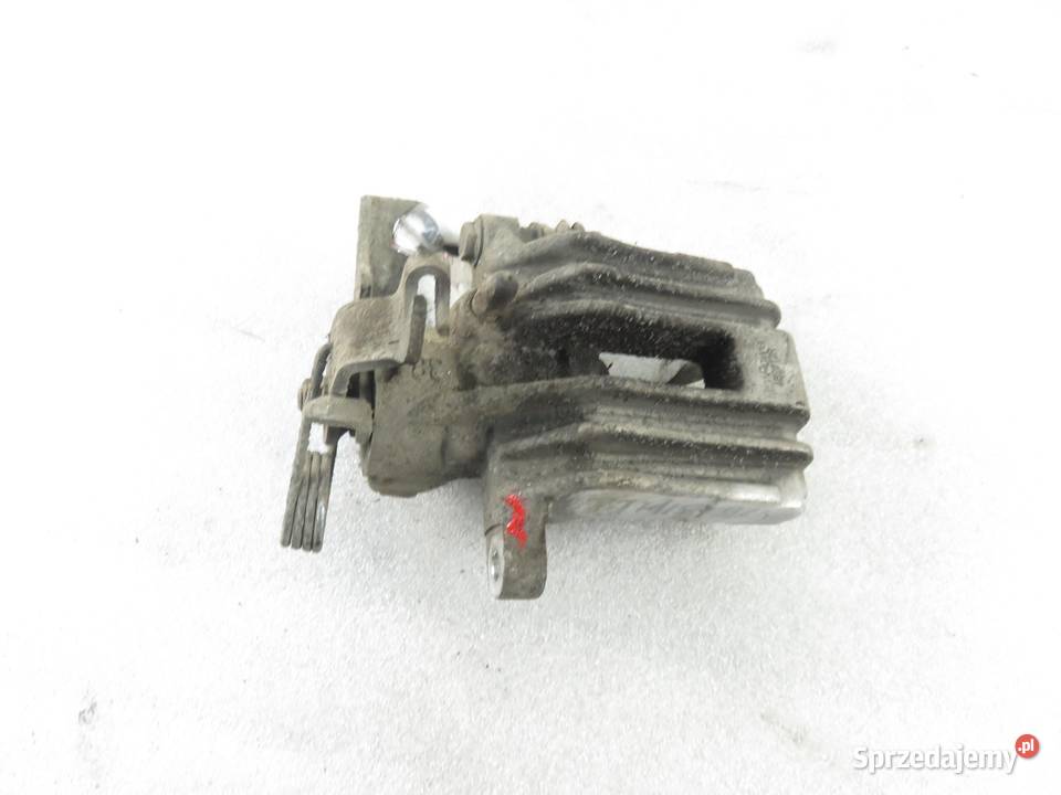 ZACISK PRAWY TYŁ AUDI A6 C5 19 TDI