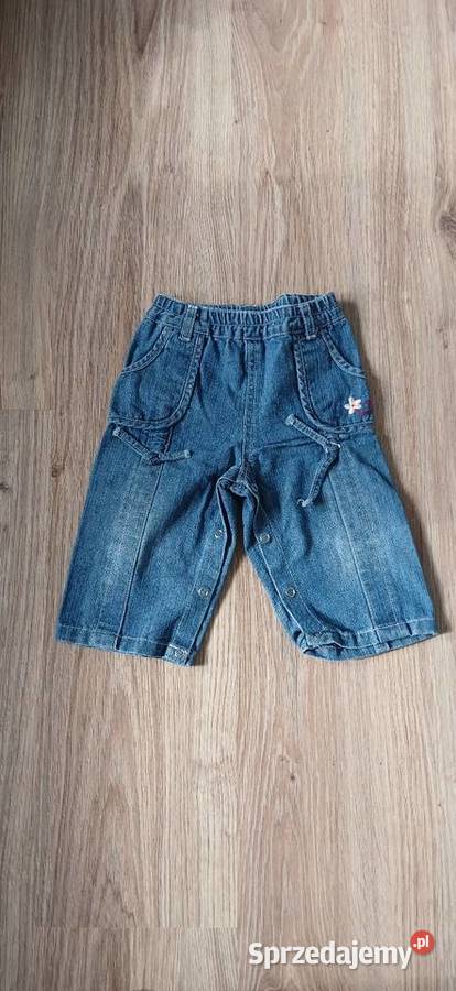 Spodnie niemowlęce ala jeans z kwiatkiem Spodnie