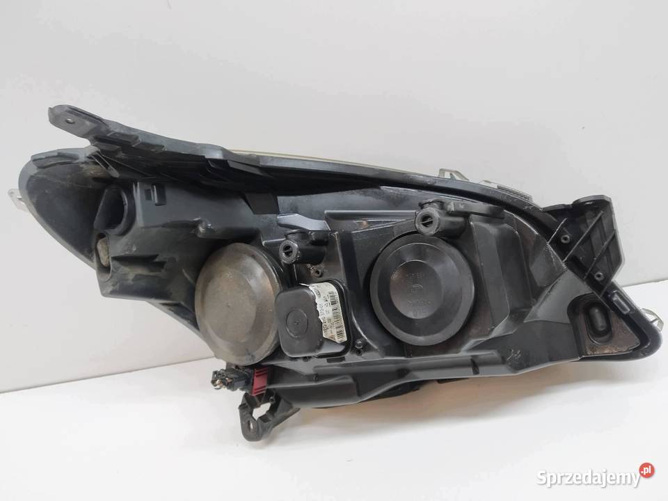 LAMPA PRZÓD LEWA EU 1EG27037001 Opel Astra III