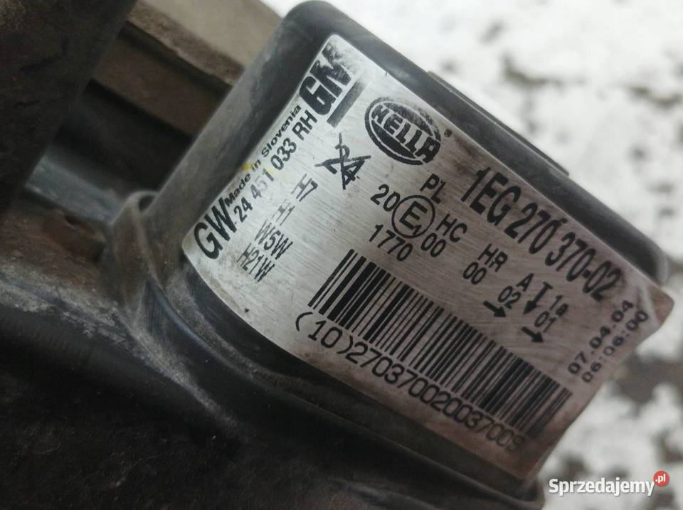 LAMPA PRZÓD PRAWA 24451033 1EG27037002 Opel osobowe