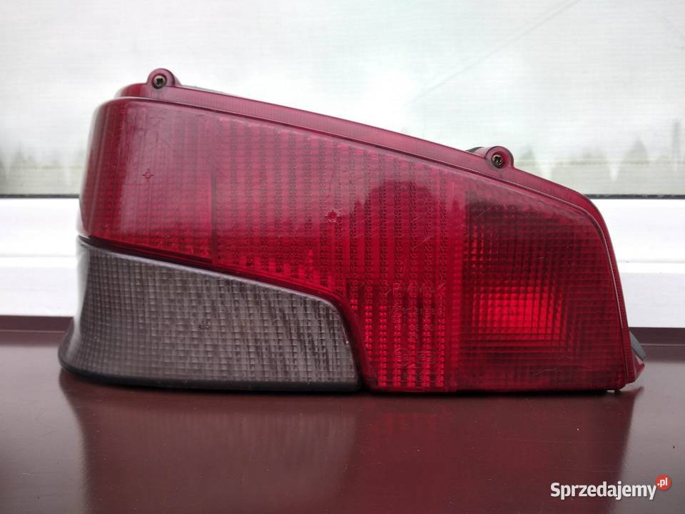 Peugeot 106 lampa tył tylna lewa wkład oprawka osobowe Części samochodowe łódzkie Sieradz