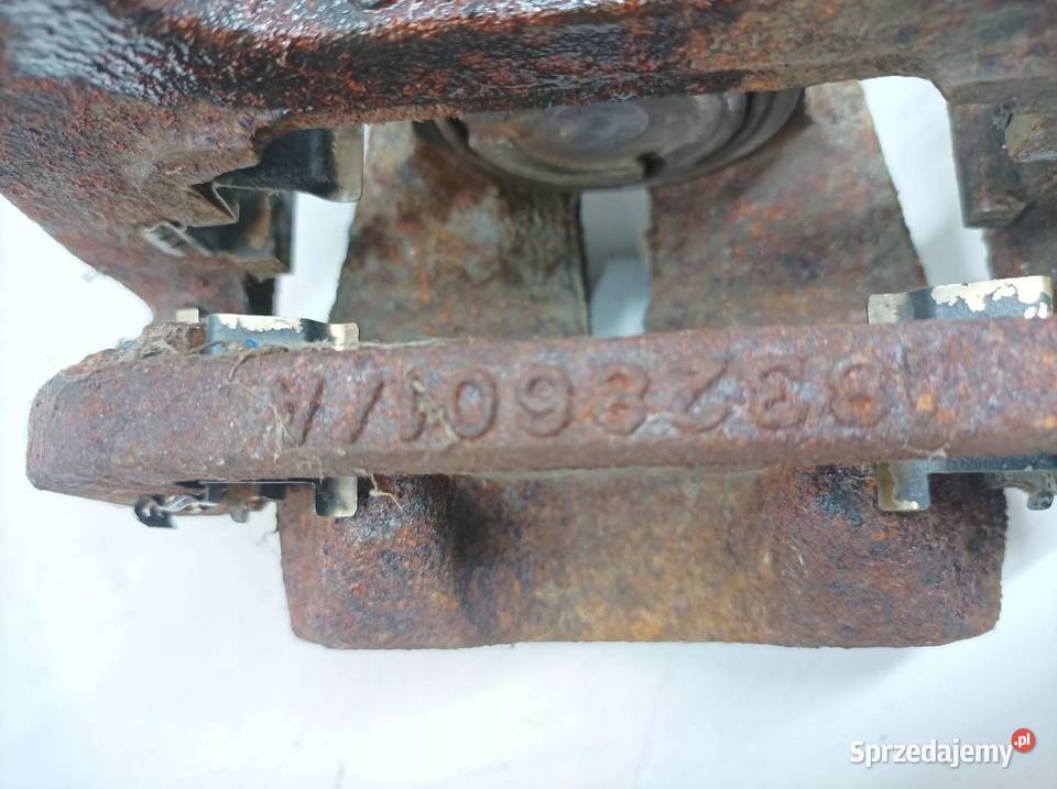 ZACISK HAMULCOWY PRAWY TYŁ 32 B KL Jeep Cherokee