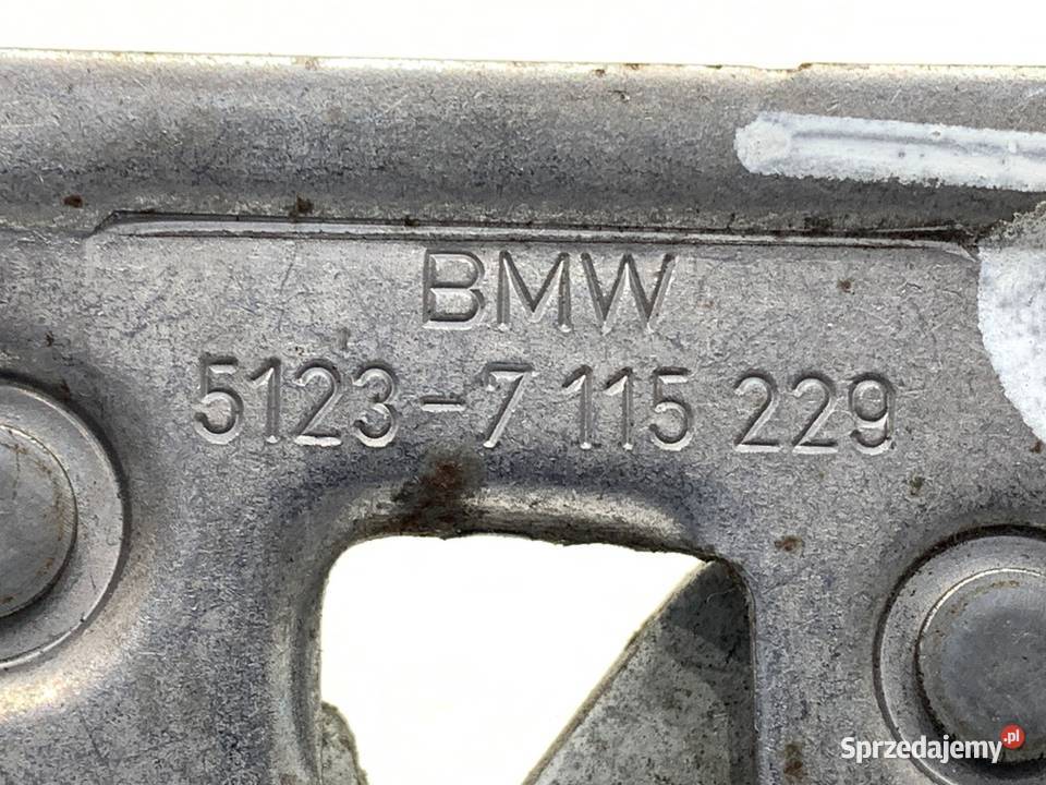 ZAMEK MASKI PRAWY BMW E84 SUV 7115229 0915 Karoseria