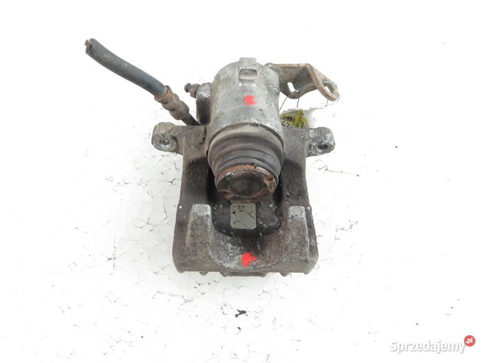 ZACISK PRAWY TYŁ SKODA OCTAVIA I