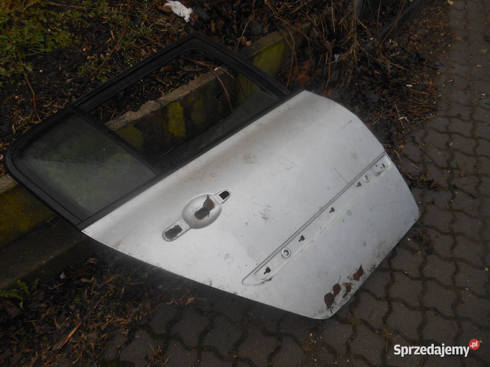 megane II tylne prawe drzwi prawe szyby z 2006r części blacharskie Bydgoszcz