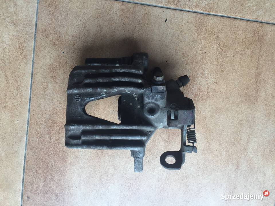 ZACISK HAMULCOWY ASTRA G II ZAFIRA B LEWY BOSCH