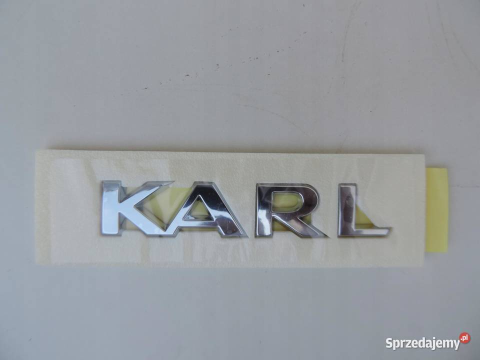 NAPIS ZNACZEK KLAPY TYŁ Opel KARL NOWY 94540484 Emblematy sprzedam