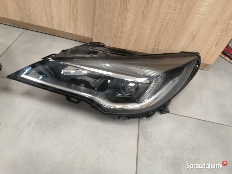 Opel Astra V K reflektor przód osobowe Kozubszczyzna