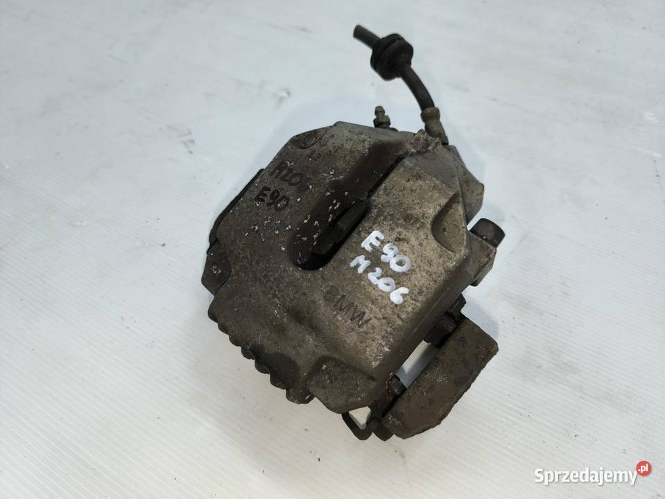 ZACISK LEWY PRZÓD KOMPLETNY BMW E90 E91