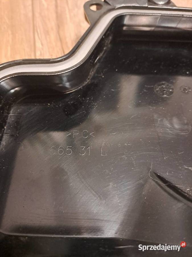 Zaślepka lewej lampy ksenon bmw e90 2010r polift Zręcin