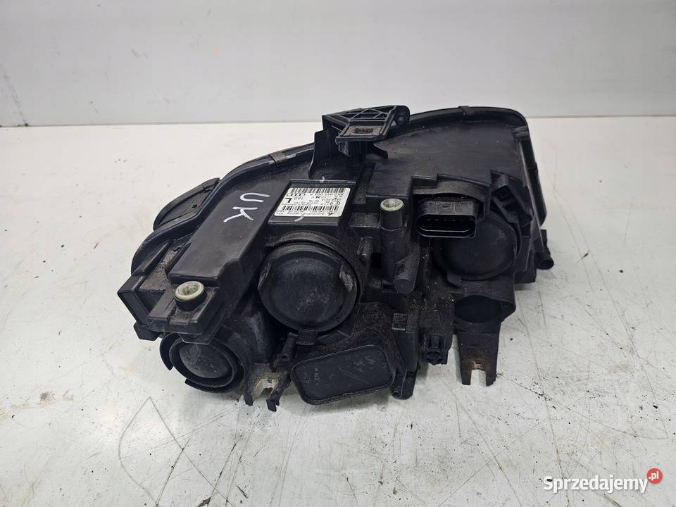 REFLEKTOR LEWY PRZÓD AUDI A4 B8 8K0941003A OK Przystajń
