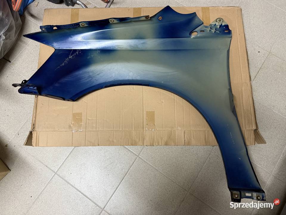 Błotnik prawy przód Dodge Grand Caravan oryginał Kolbuszowa Dolna sprzedam