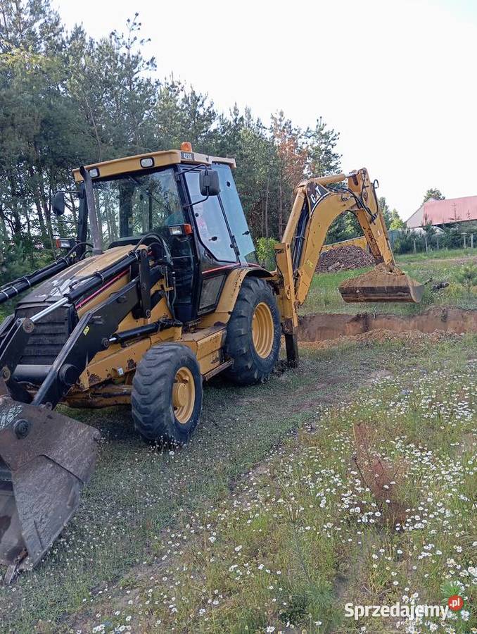 Usługi koparkoładowarką Cat 428D Wykopy, roboty ziemne Wykopy, roboty ziemne Pustków
