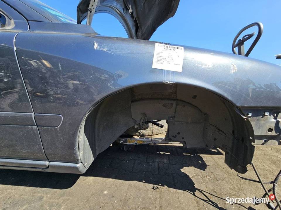 BŁOTNIK PRAWY PRZÓD VOLVO S60 TITANIUM GREY Pozostałe Lipno