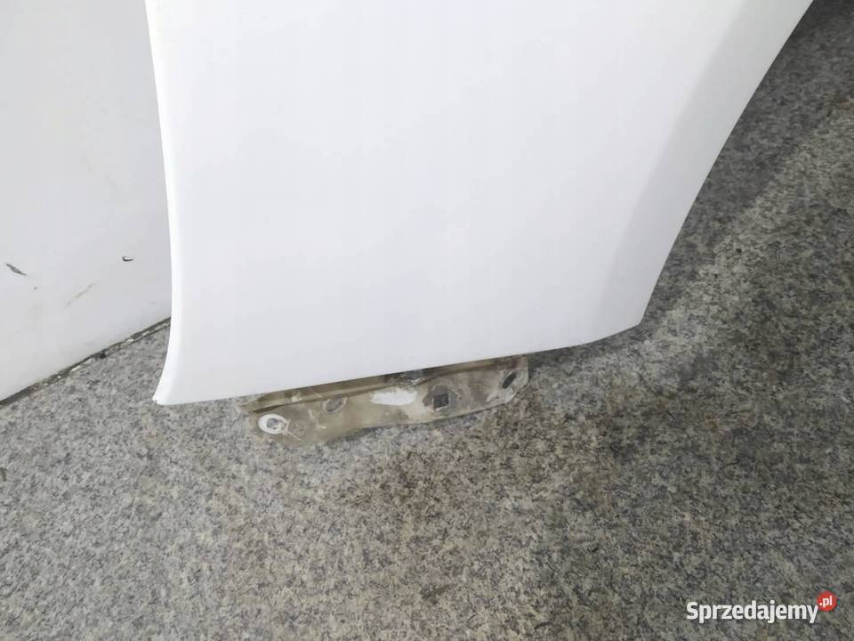 BŁOTNIK LEWY PRZÓD BIAŁY Opel Zafira III 2011