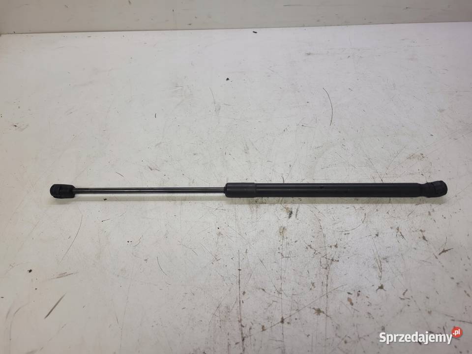 SIŁOWNIK MASKI AUDI Q7 4L 4L0823359 śląskie Przystajń