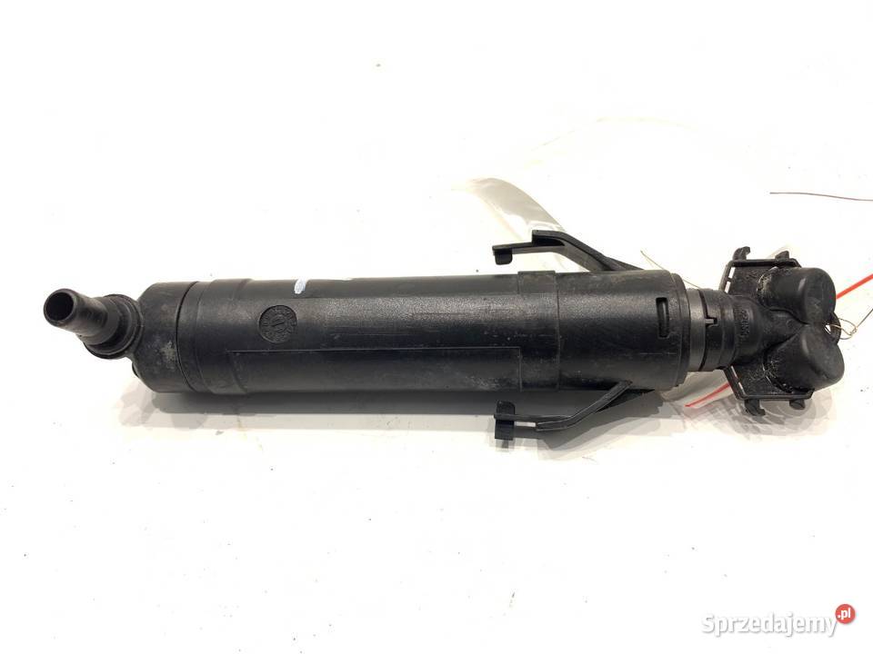 SPRYSKIWACZ REFLEKTORA LEWY PRZÓD VW PASSAT B7