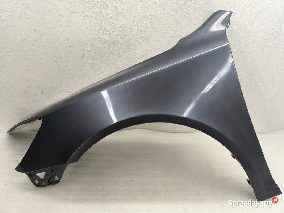 BŁOTNIK LEWY PRZÓD 9153 LIFT SKODA OCTAVIA II osobowe wielkopolskie