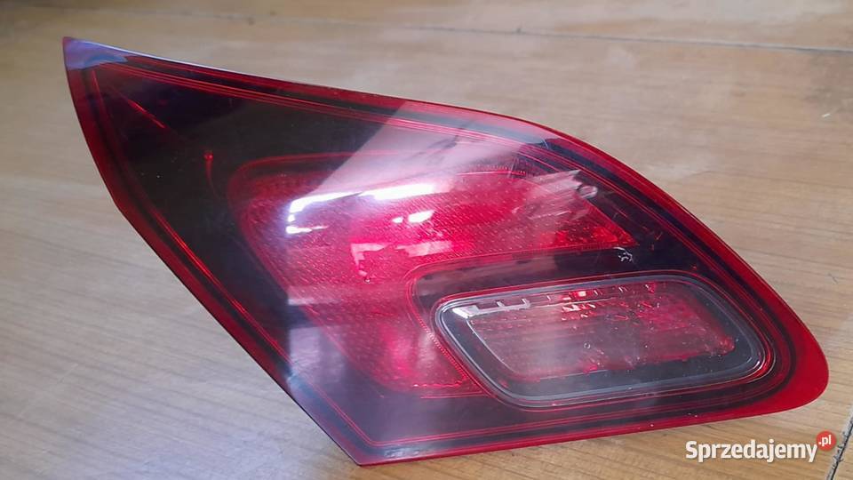 Lampa lewa tylna w klapie dymiona Opel Astra J małopolskie Miechów-Charsznica sprzedam