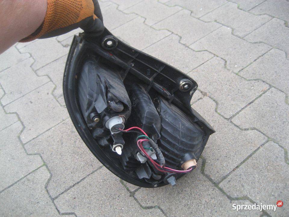 daihatsu sirion 0205r lampa tył lewa kompletna Rakoniewice