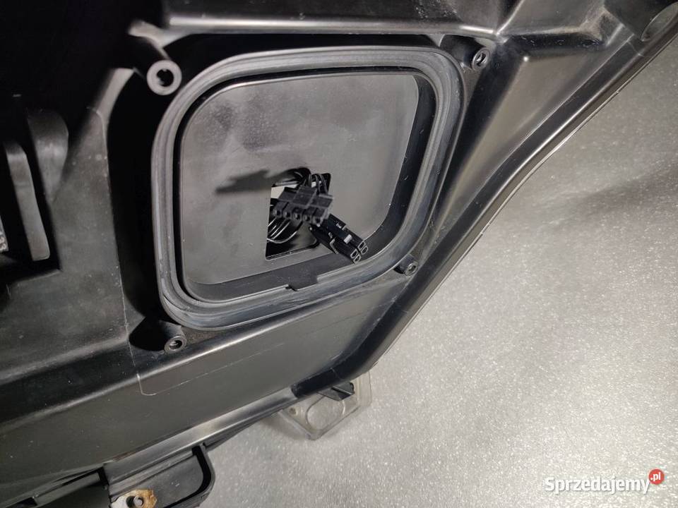 REFLEKTOR LEWY OPEL ASTRA J OPC 711307024054 Lampy przednie Żmigród