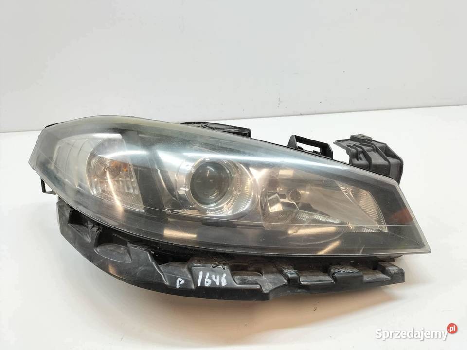 LAMPA PRZÓD PRAWA LIFT XENON 7701476387 Renault