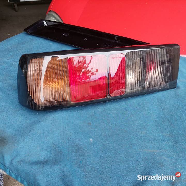 Ford sierra sedan lampy tył ciemne blenda prawa osobowe Piaseczno
