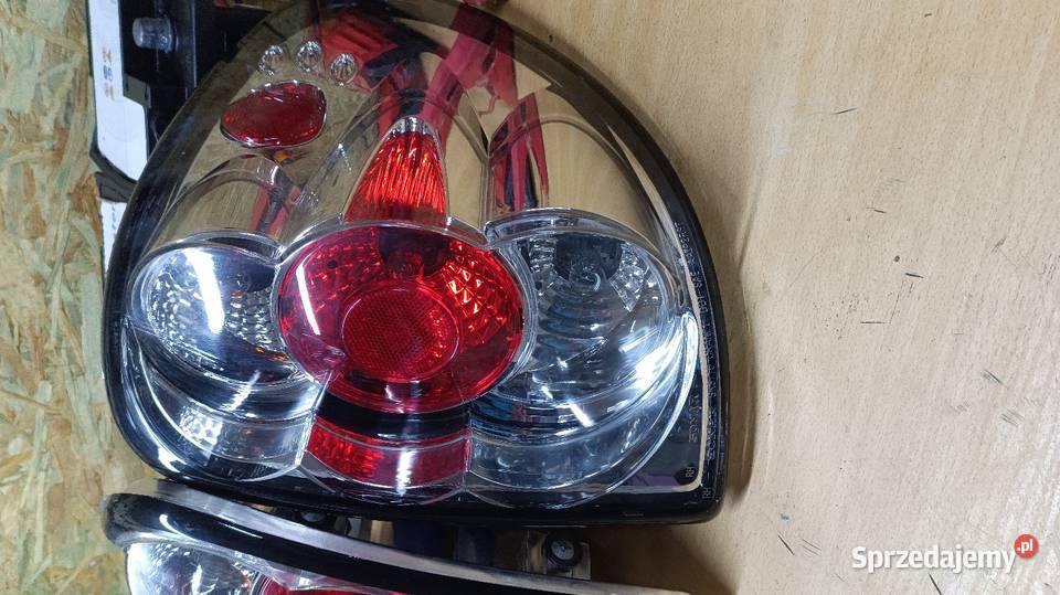 Lampy tył nowe Chrysler Voyager 0107 Dodge Grand Częstochowa