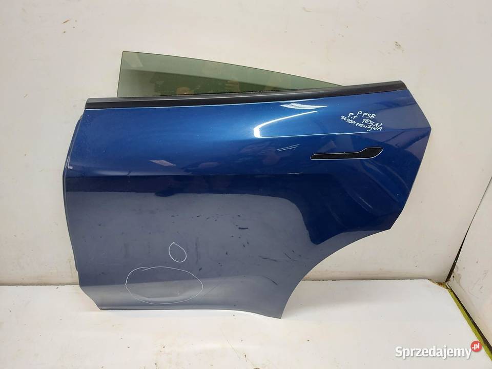 TESLA MODEL Y 2024r DRZWI LEWY TYŁ NIEBIESKI osobowe