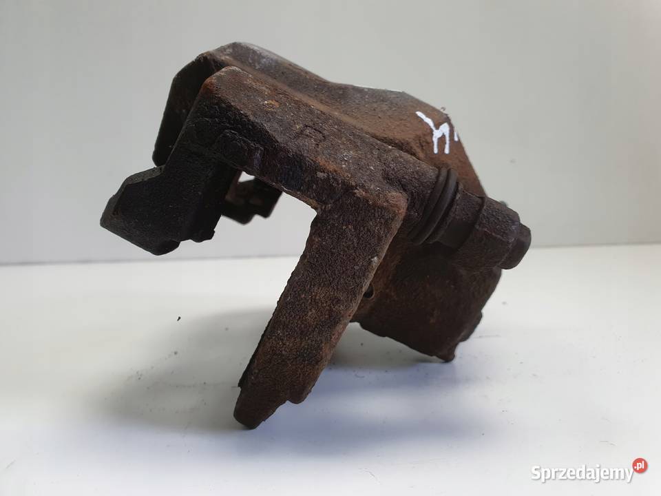 Toyota RAV4 IV III PRZEDNI ZACISK HAMULCOWY