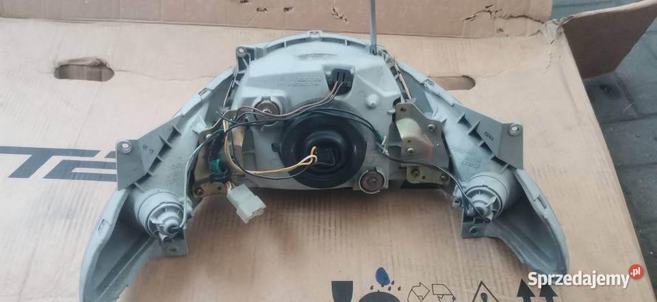 Lampa przód burgman 250 400 k1 cześći wysyłka na