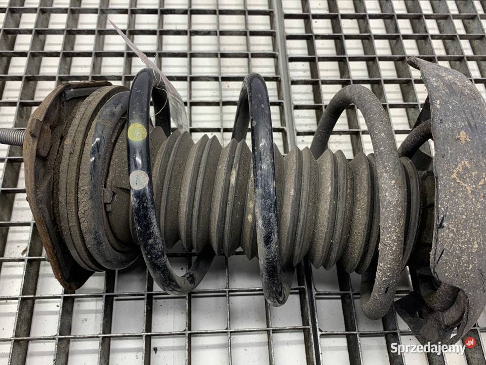 AMORTYZATOR LEWY PRZÓD ZE SPRĘŻYNĄ TOYOTA