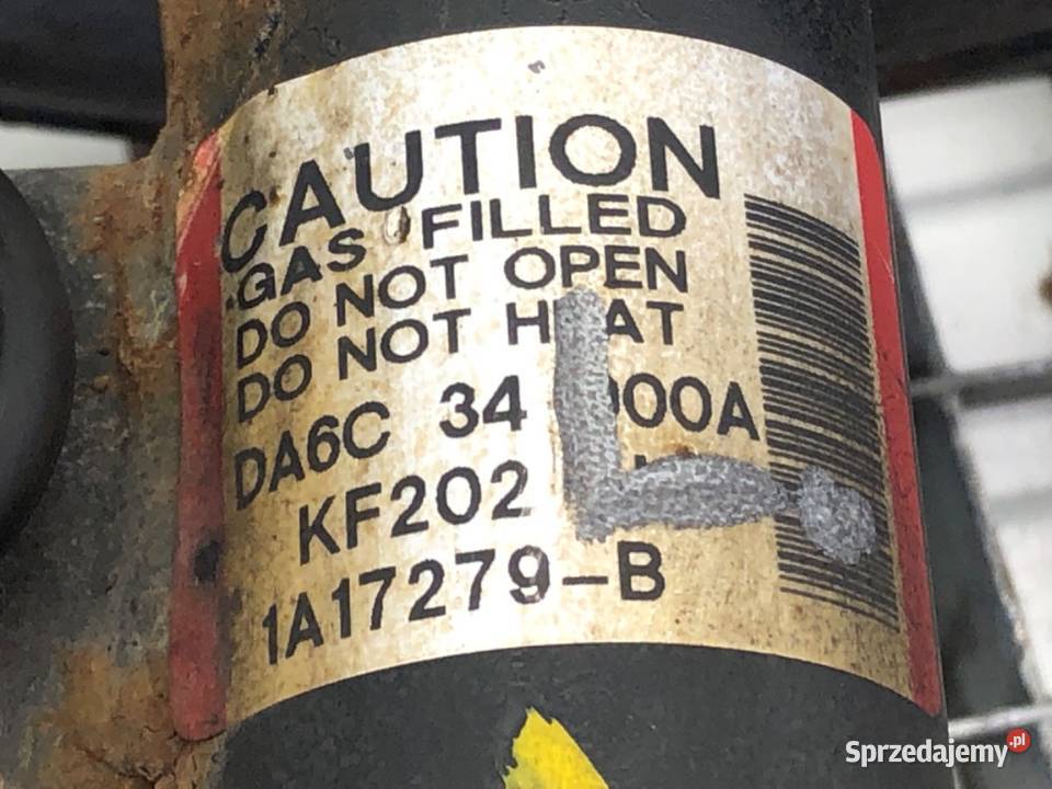 AMORTYZATOR LEWY PRZÓD SPRĘŻYNA MAZDA 2 DL 15