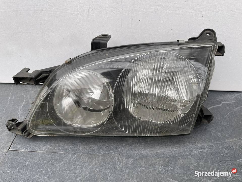 TOYOTA AVENSIS 1 T22 LEWA LAMPA PRZÓD
