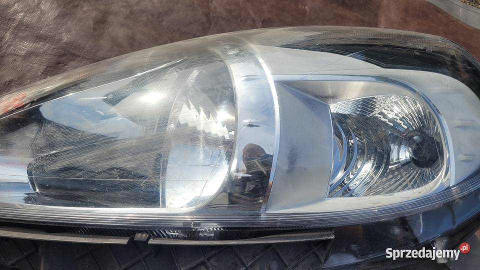 FIAT GRANDE PUNTO EVO 09 LAMPA LEWA PRZÓD osobowe Ruda Śląska