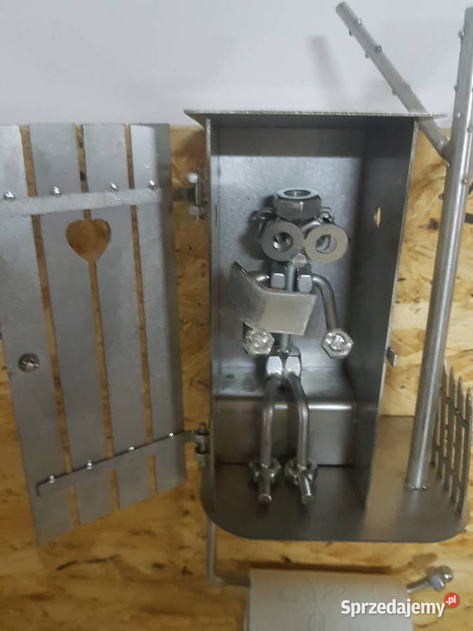 FIGURKA Z METALU WC GAZETA Z ROLKĄ NA PAPIER wielkopolskie Głogowa